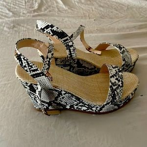 Brand new black and  white embossed wedge sandals.